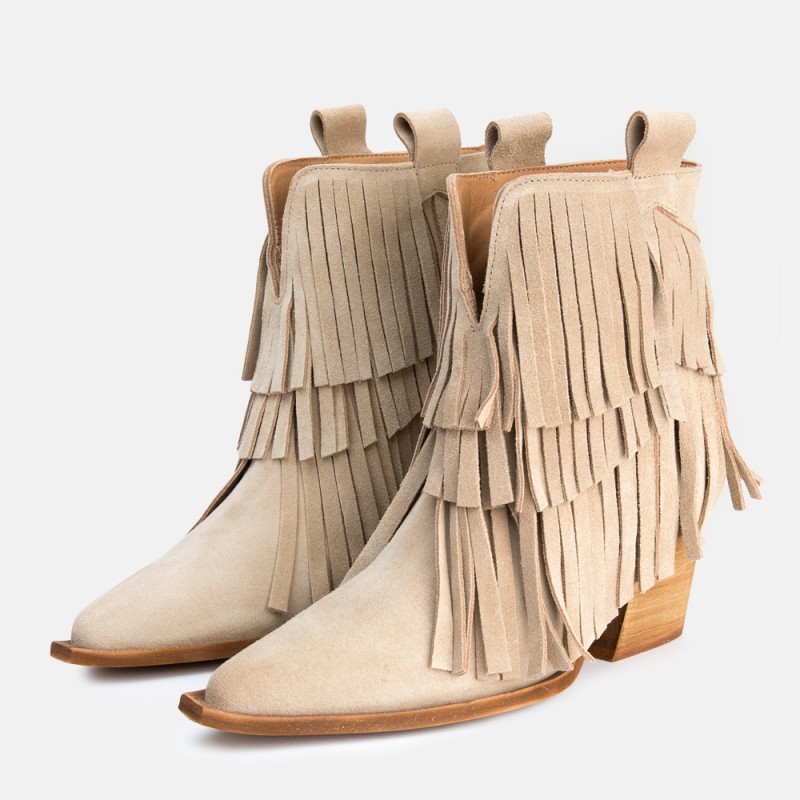 Beige Fringed suede leather ankle boots Given