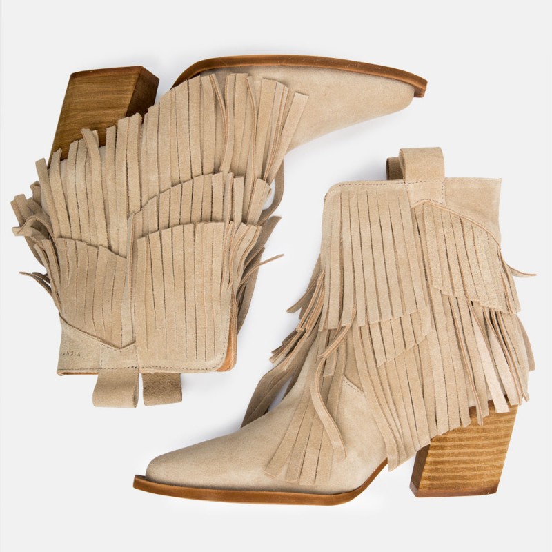 Beige Fringed suede leather ankle boots Given