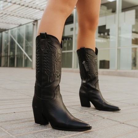 Black embroidered leather cowboy boots Given